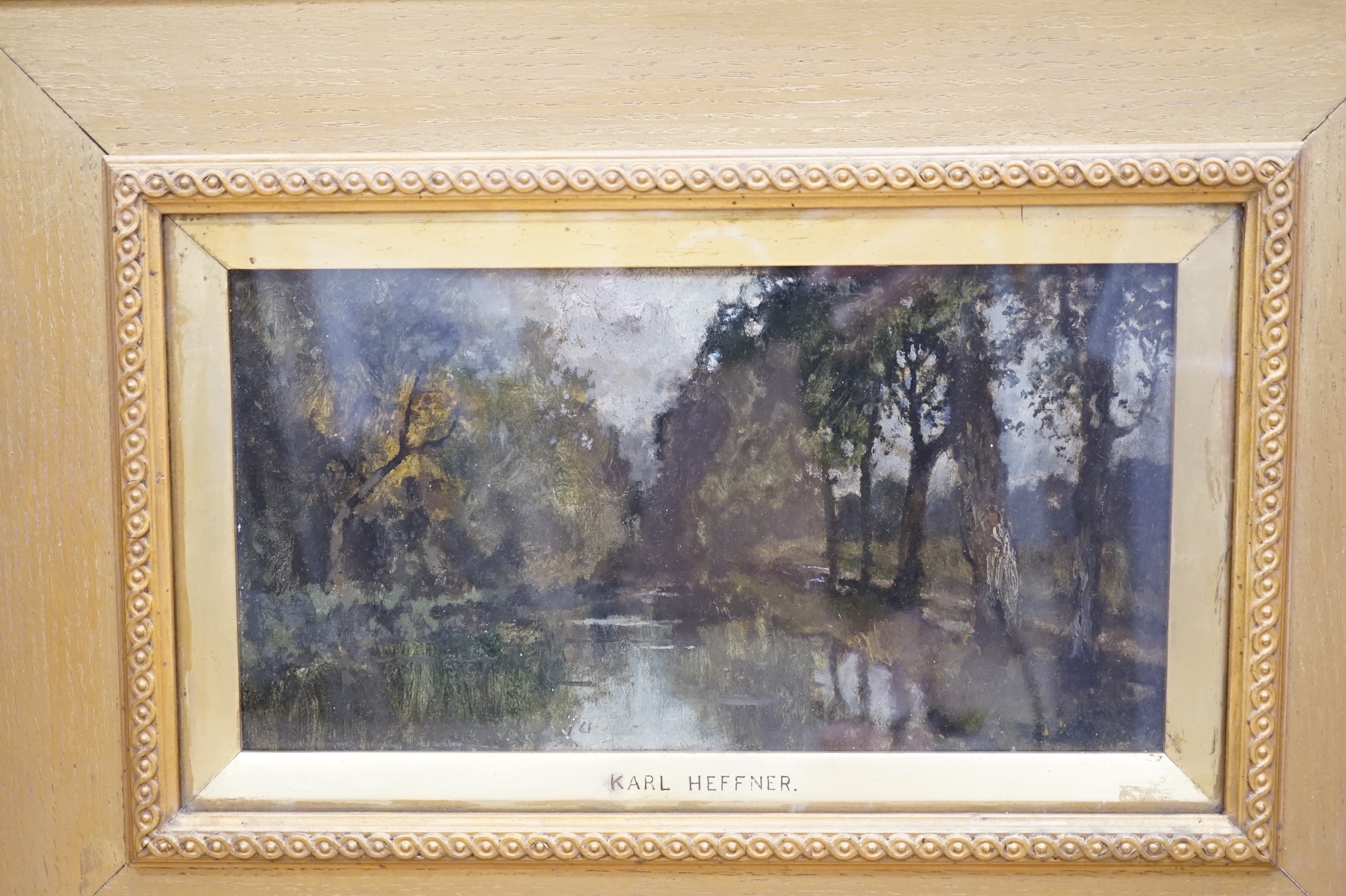 Karl Heffner (1849-1925), oil on artist's board, Study from nature, Bavaria, unsigned, inscribed to the mount, stencil verso 977J, 14 x 26cm, ornately framed. Condition - fair to good, a little dirty